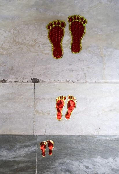 Decorative footsteps indicating a welcome into a Hindu household at Diwali festival time