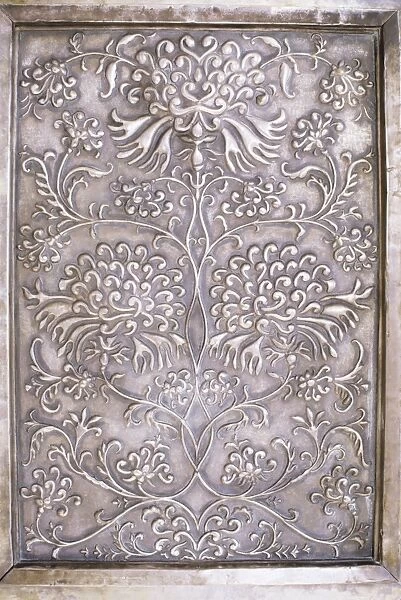 Detail of decorative raised metal work