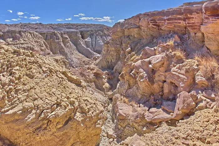 Framed Print : A deep canyon eroded thru the hills of purple and gray bentonite clay near Hamilili Point on the south end of Petrified Forest National Park, Arizona, United States of America, North America Framed Print : A deep canyon eroded thru the hills of purple and gray bentonite clay near Hamilili Point on the south end of Petrified Forest National Park, Arizona, United States of America, North America