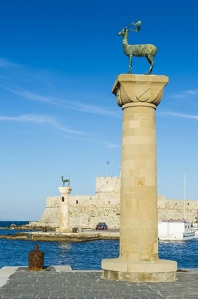 The deer, symbol of the city, at the entrance to Mandraki harbour, the Medieval Old