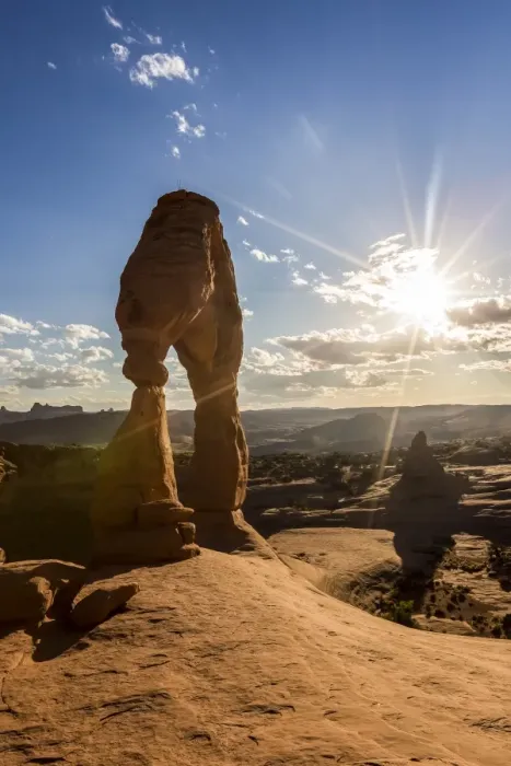 Framed Print : Delicate Arch with sun and clouds at golden hour, Arches National Park, Moab, Grand County Framed Print : Delicate Arch with sun and clouds at golden hour, Arches National Park, Moab, Grand County