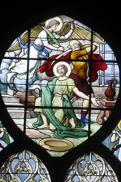 Depiction of the Martyrdom of St. John the Baptist in stained glass in Saint Severin