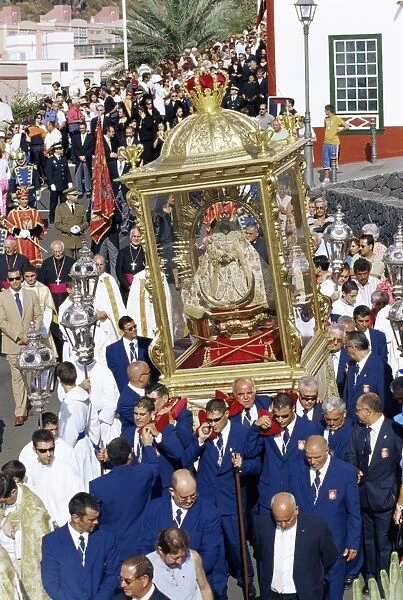 The Descent of Our Lady of Snows shrine carried through the streets during religious festival