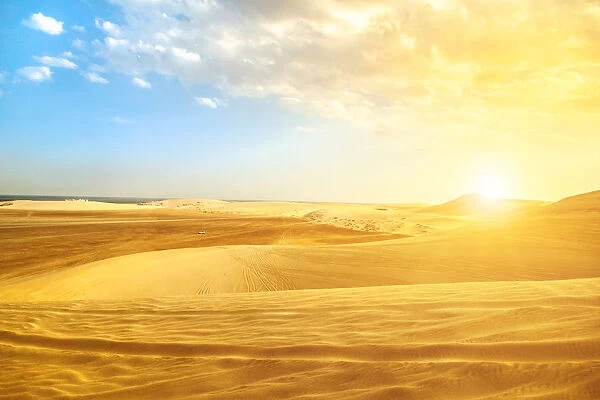 Desert landscape sand dunes at sunset near Qatar and Saudi Arabia border on Persian Gulf