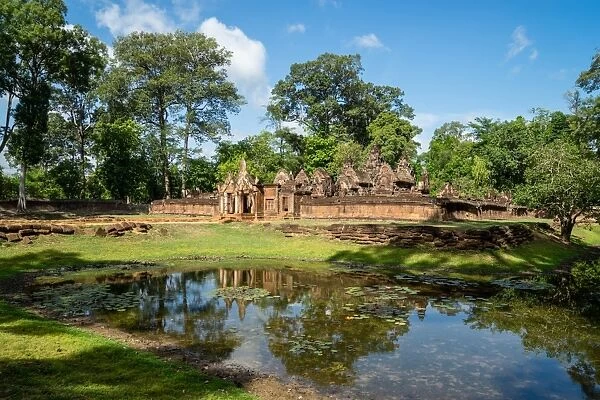 A deserted temple reflected in a lake in Siem Reap, Cambodia, Indochina, Southeast Asia