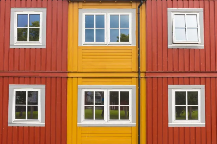 Framed Print : Details of facades and windows of typical wooden houses of fishermen in Svolvaer Framed Print : Details of facades and windows of typical wooden houses of fishermen in Svolvaer