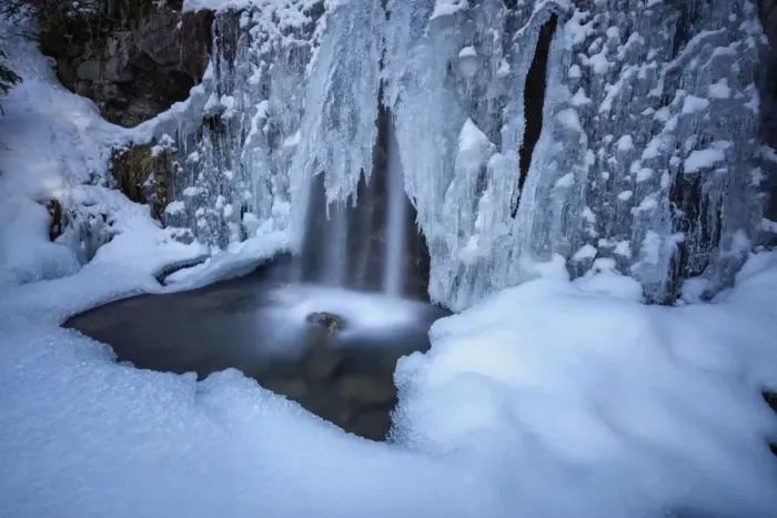 Framed Print : Details of a waterfall framed by ice and snow, Switzerland, Europe Framed Print : Details of a waterfall framed by ice and snow, Switzerland, Europe