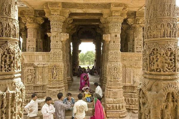Devotees at the Sun Temple, Modhera, Gujarat, India, Asia