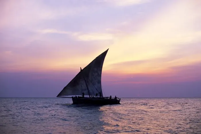 Framed Print : Dhow in silhouette on the Indian Ocean at sunset, off Stone Town, Zanzibar Framed Print : Dhow in silhouette on the Indian Ocean at sunset, off Stone Town, Zanzibar