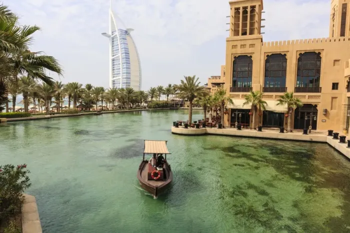 Framed Print : Dhows cruise around the Madinat Jumeirah Hotel with Burj Al Arab in the background, Dubai, United Arab Emirates, Middle East Framed Print : Dhows cruise around the Madinat Jumeirah Hotel with Burj Al Arab in the background, Dubai, United Arab Emirates, Middle East