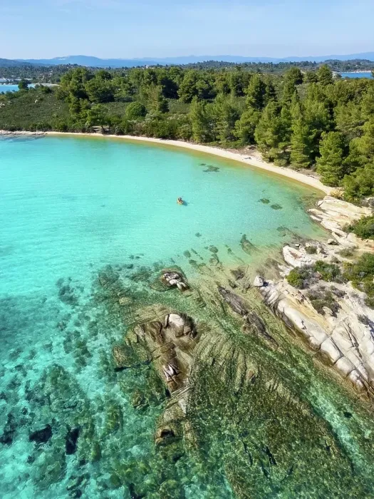 Framed Print : Diaporos island with wild beaches and a kayak on the turquoise water, drone aerial view, Chalkidiki, Greece Framed Print : Diaporos island with wild beaches and a kayak on the turquoise water, drone aerial view, Chalkidiki, Greece