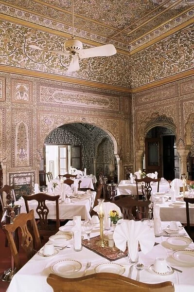Dining area with exquisite hand painted walls and ceilings