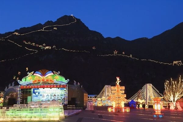 A display of night time illuminations and copy of the Great Wall of China at Longqing Gorge Ice sculpture festival, Beijing