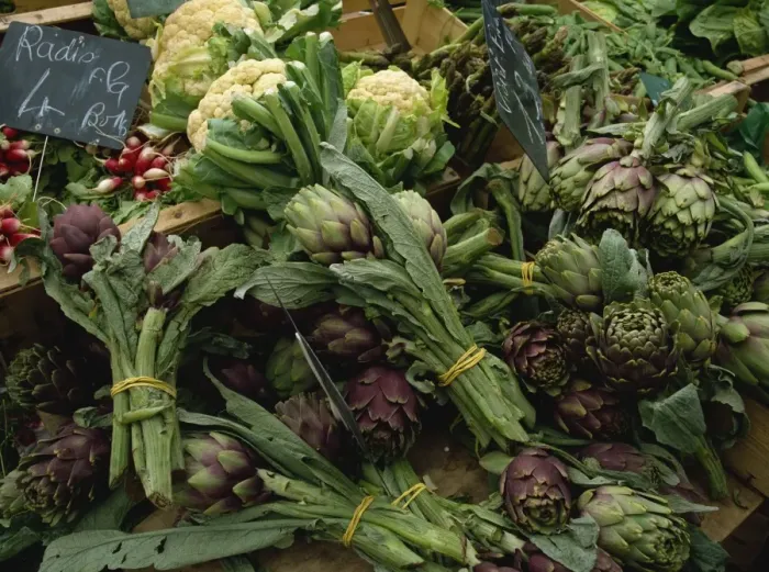 Framed Print : A display of vegetables, mainly artichokes and cauliflowers on a market stall in Normandy Framed Print : A display of vegetables, mainly artichokes and cauliflowers on a market stall in Normandy