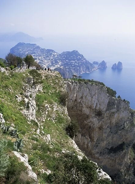 Distant Capri village and Faraglioni Rocks