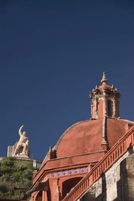 Framed Print : Dome of the Temple of San Diego in foreground, with monument to El Pipila beyond