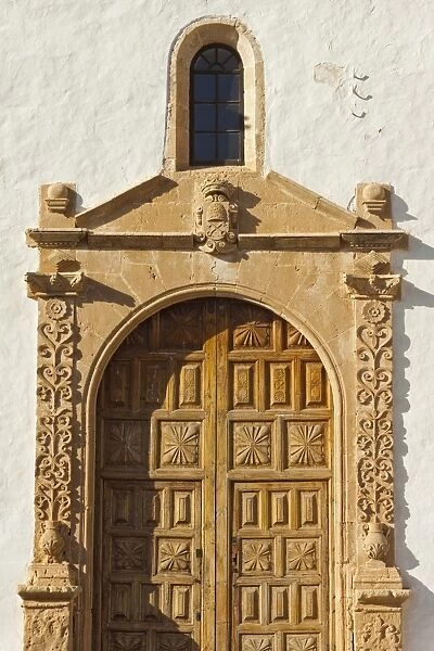 Doorway of beautiful 17th century Santa Maria Cathedral in this historic former capital, Betancuria, Fuerteventura, Canary Islands, Spain, Europe