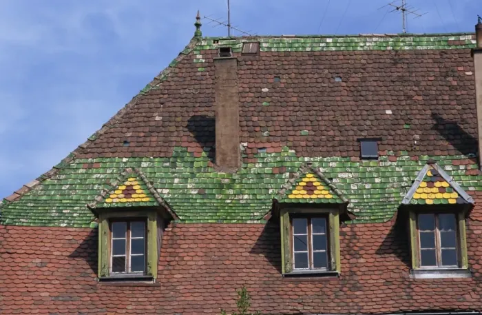 Framed Print : Dormer windows and decorative tiles on a typical roof in the old town of Ribeauville