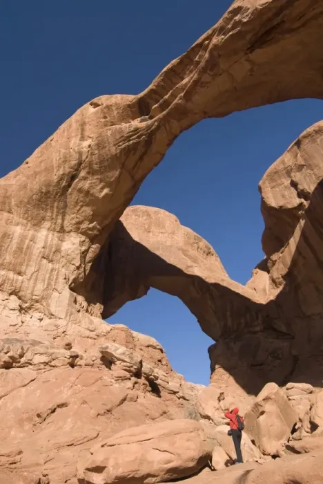 Framed Print : Double Arch and tourist taking a photograph, Arches National Park, Utah Framed Print : Double Arch and tourist taking a photograph, Arches National Park, Utah