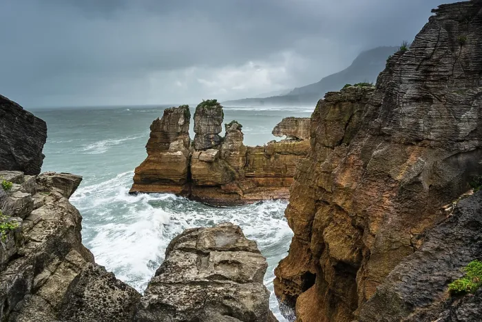 Framed Print : Dramatic Rock Spires and Crashing Waves at Pancake Rocks, Punakaiki, Paparoa National Park, West Coast, New Zealand Framed Print : Dramatic Rock Spires and Crashing Waves at Pancake Rocks, Punakaiki, Paparoa National Park, West Coast, New Zealand