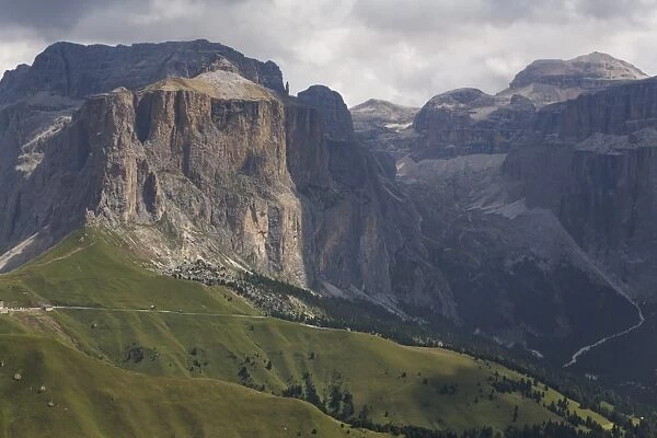 The dramatic Sass Pordoi mountain in the Dolomites near Canazei, Trentino-Alto Adige, Italy, Europe