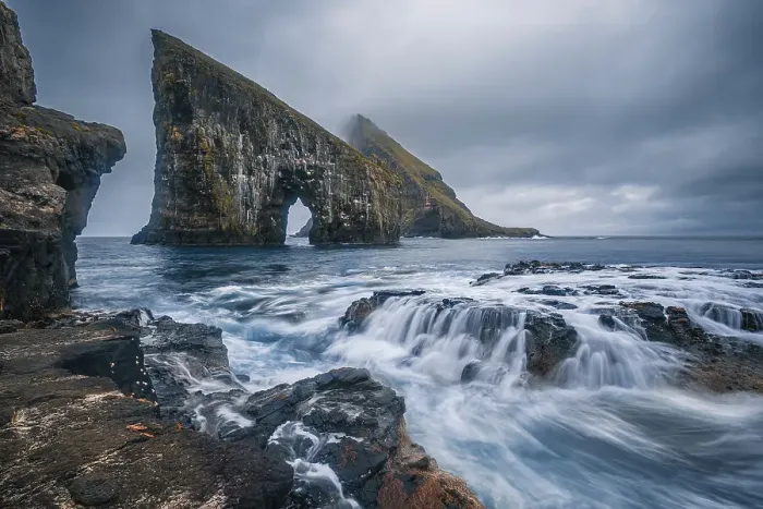 Framed Print : Dramatic Sea Arch of Drangarnir and waves crashing on the Faroe Islands coast, Faroe Islands, Denmark, Atlantic, Europe Framed Print : Dramatic Sea Arch of Drangarnir and waves crashing on the Faroe Islands coast, Faroe Islands, Denmark, Atlantic, Europe
