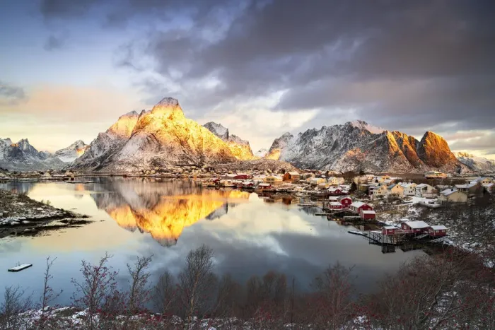 Framed Print : Dramatic sky at dawn over Mount Olstind covered with snow, Reine Bay, Nordland Framed Print : Dramatic sky at dawn over Mount Olstind covered with snow, Reine Bay, Nordland