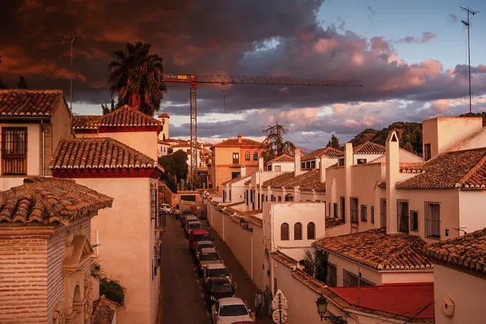 Framed Print : Dramatic warm sunset over Santa Isabel la Real, the main alley of Albaicin, UNESCO, Granada, Andalusia, Spain Framed Print : Dramatic warm sunset over Santa Isabel la Real, the main alley of Albaicin, UNESCO, Granada, Andalusia, Spain