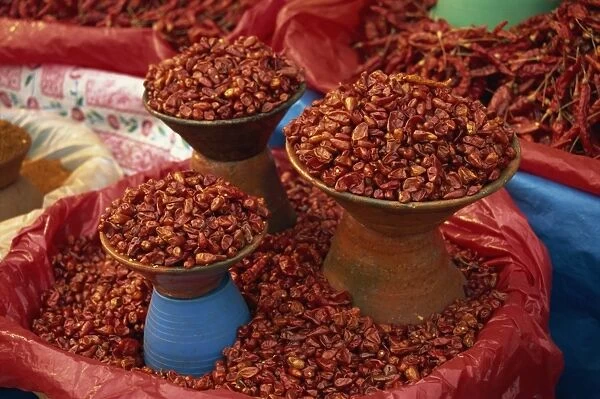 Dried red chillis in bowls for sale at San Cristobal de las Casas in Chiapas state