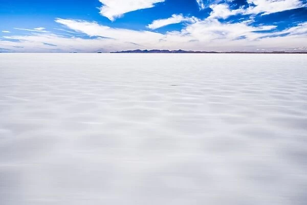 Driving through Uyuni Salt Flats (Salar de Uyuni), Uyuni, Bolivia, South America