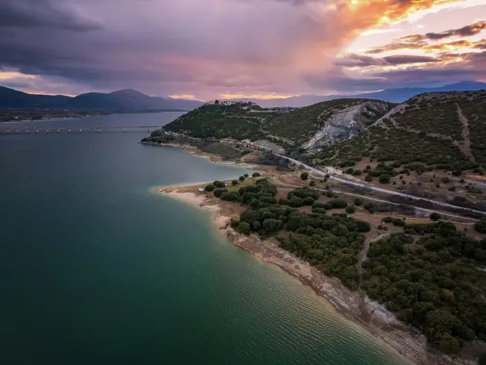 Framed Print : Drone aerial view of Lake Polyfyto mountain landscape and high bridge of Servia Neraida at sunset, Kozani, Macedonia, Greece Framed Print : Drone aerial view of Lake Polyfyto mountain landscape and high bridge of Servia Neraida at sunset, Kozani, Macedonia, Greece