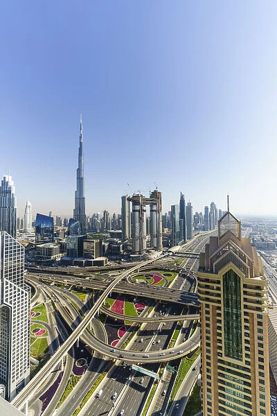 Dubai skyline and Sheikh Zayed Road Interchange, Dubai, United Arab Emirates, Middle East