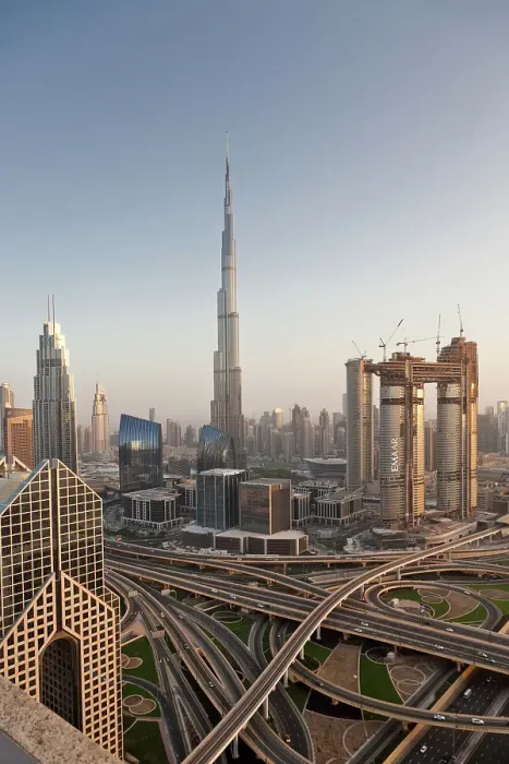 Framed Print : Dubai skyline at sunset with Burj Khalifa, the world tallest building and Sheikh Zayed road traffic, Dubai, United Arab Emirates