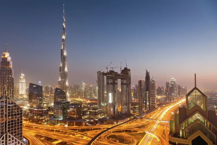 Framed Print : Dubai skyline at sunset with Burj Khalifa, the world tallest building and Sheikh Zayed road traffic, Dubai, United Arab Emirates Framed Print : Dubai skyline at sunset with Burj Khalifa, the world tallest building and Sheikh Zayed road traffic, Dubai, United Arab Emirates