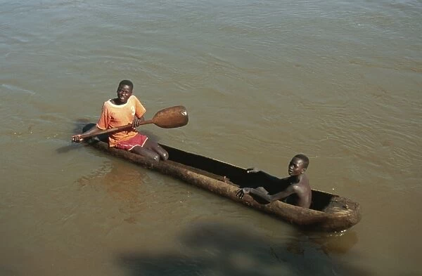 Dugout canoe used as ferry, Bonga River, Ethiopia, Africa
