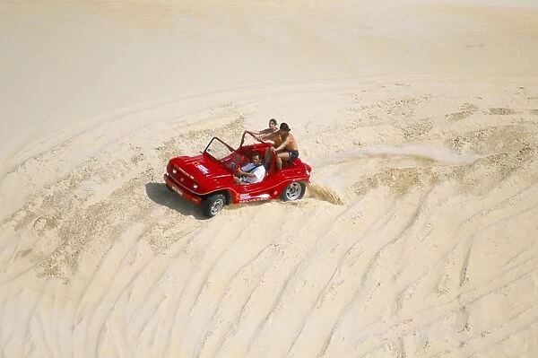 Dune buggy on sand dunes, Genipabu (Natal), Rio Grande do Norte state, Brazil