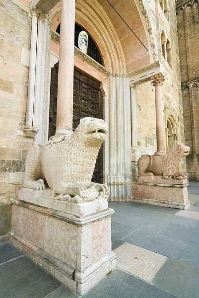 Duomos facade with two lion statues, Parma, Emilia Romagna, Italy, Europe