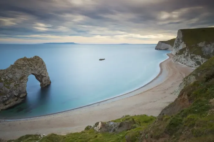 Framed Print : Durdle Door, an eroded rock arch, and the wide sweeping beach, Jurassic Coast, UNESCO World Heritage Site, Dorset, England, United Kingdom, Europe Framed Print : Durdle Door, an eroded rock arch, and the wide sweeping beach, Jurassic Coast, UNESCO World Heritage Site, Dorset, England, United Kingdom, Europe