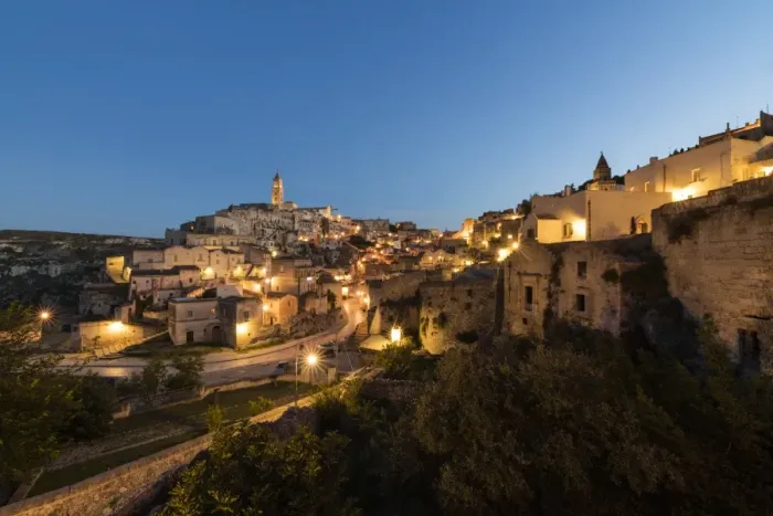 Framed Print : Dusk on the ancient town and historical center called Sassi, perched on rocks on top of hill Framed Print : Dusk on the ancient town and historical center called Sassi, perched on rocks on top of hill