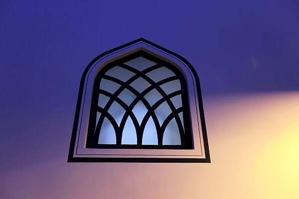 Dusk falls on a mosque window in the centre of the old city of Antayla
