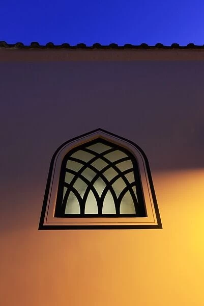 Dusk falls on a mosque window in the centre of the old city of Antayla
