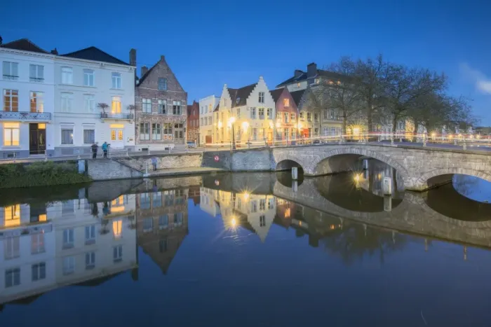 Framed Print : Dusk lights on the historic buildings of the city centre reflected in typical canals