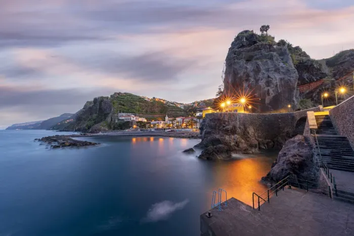 Framed Print : Dusk lights over the seaside town resort of Ponta do Sol washed by the ocean Framed Print : Dusk lights over the seaside town resort of Ponta do Sol washed by the ocean
