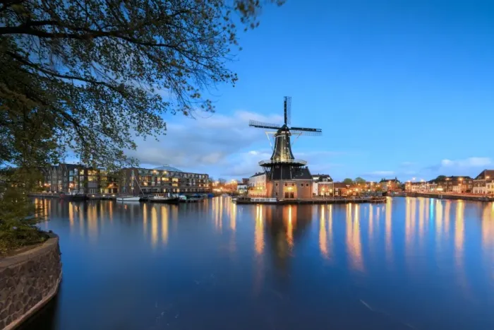 Framed Print : Dusk lights on the Windmill De Adriaan reflected in the River Spaarne, Haarlem, North Holland Framed Print : Dusk lights on the Windmill De Adriaan reflected in the River Spaarne, Haarlem, North Holland