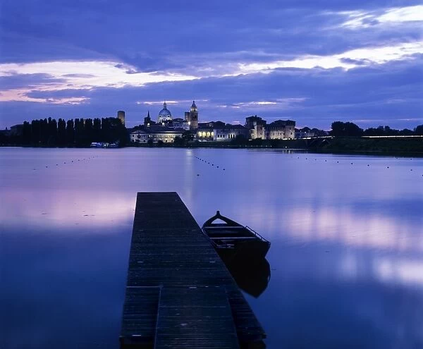 Dusk over the old town and Lake Inferiore, Mantua, Lombardy, Italy, Europe
