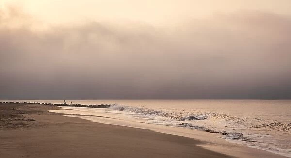 Early morning fisherman on Will Rogers Beach, Pacific Palisades, California, United