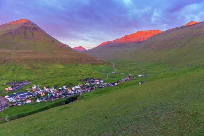Framed Print : Early morning on Gjogv village with the mountain peaks lit by the sun, Eysturoy island, Faroe islands, Denmark, Europe Framed Print : Early morning on Gjogv village with the mountain peaks lit by the sun, Eysturoy island, Faroe islands, Denmark, Europe