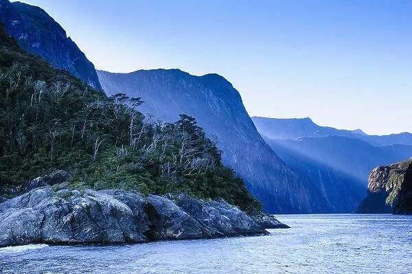 Early morning light in Milford Sound, Fiordland National Park, UNESCO World Heritage Site, South Island, New Zealand, Pacific