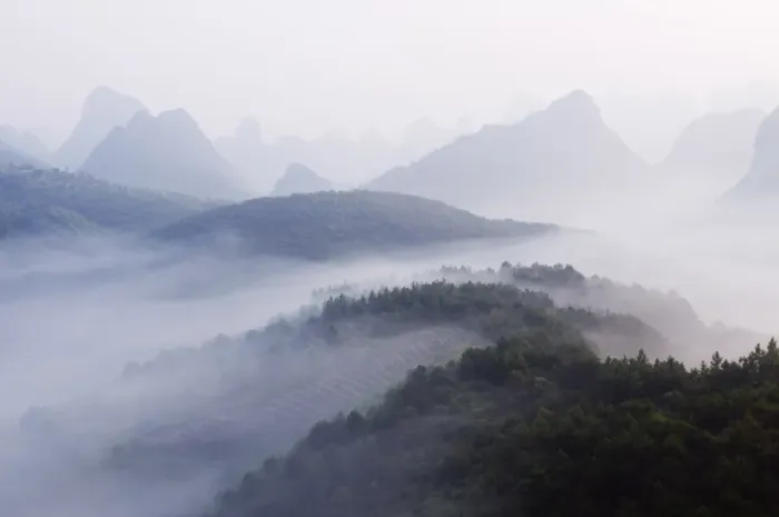 Framed Print : Early morning mist clinging to karst limestone scenery around Yangshuo Framed Print : Early morning mist clinging to karst limestone scenery around Yangshuo