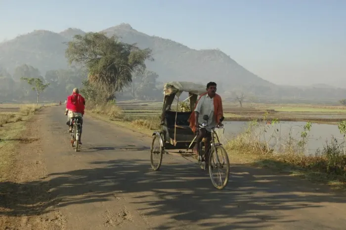 Framed Print : Early morning rickshaw wallahs pass each other in rural countryside near Baliguda Framed Print : Early morning rickshaw wallahs pass each other in rural countryside near Baliguda